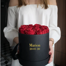 Roses éternelles par 15 dans écrin rond personnalisé